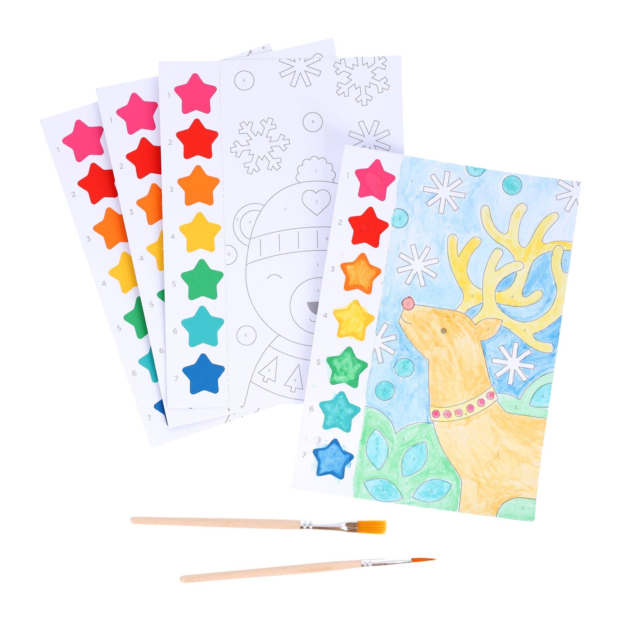 Coloring book with a reindeer illustration, star stickers, and a paintbrush on a white background