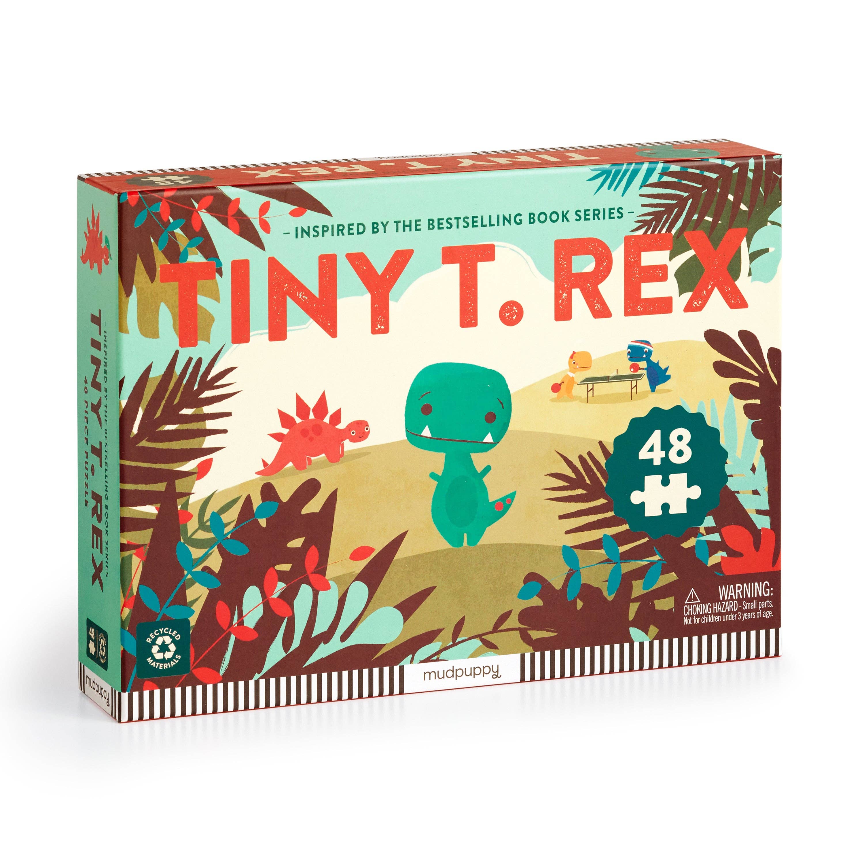 Box of 'Tiny T. Rex' puzzle with colorful design and dinosaur illustration.