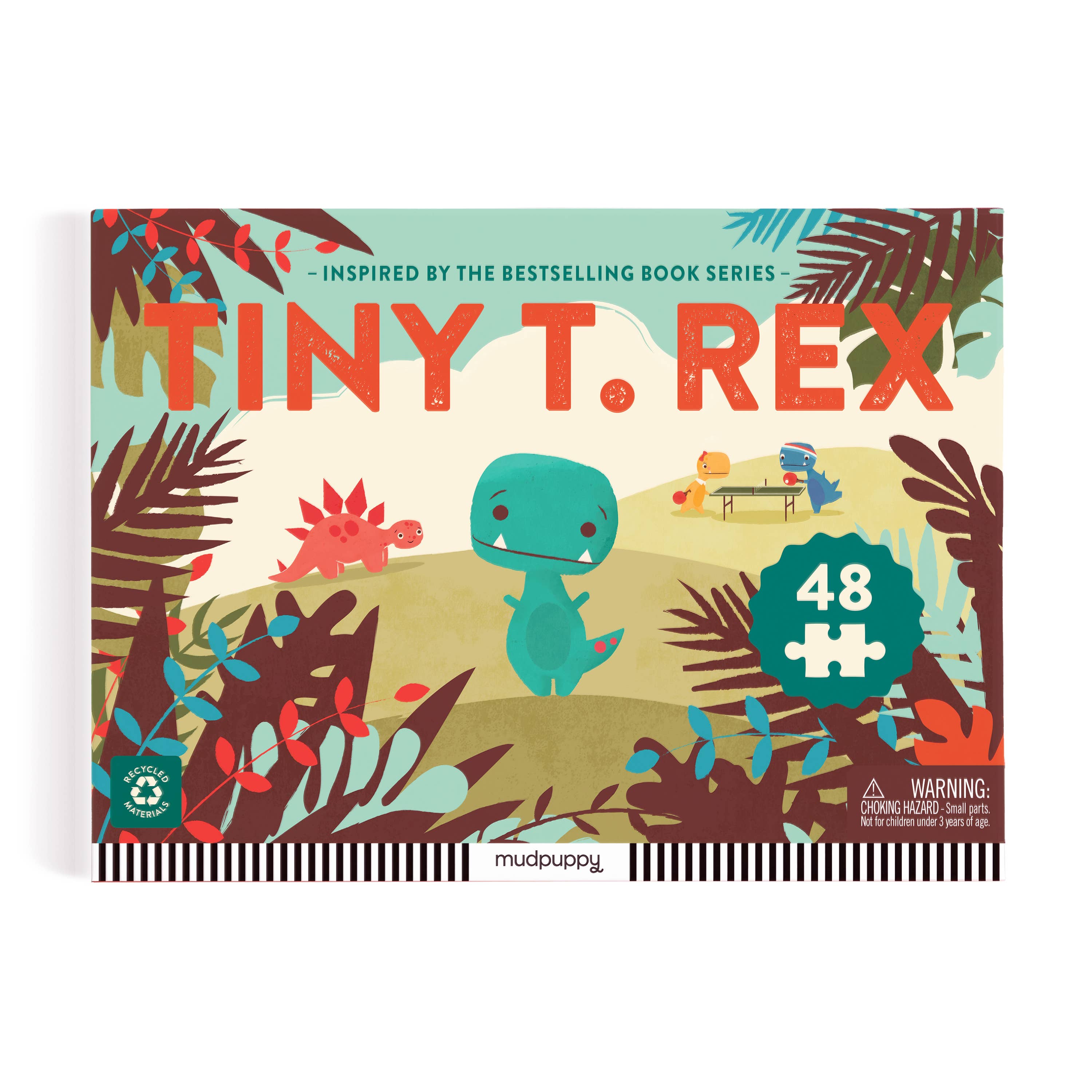 Jigsaw puzzle box for 'Tiny T. Rex' with colorful dinosaur illustration on a white background