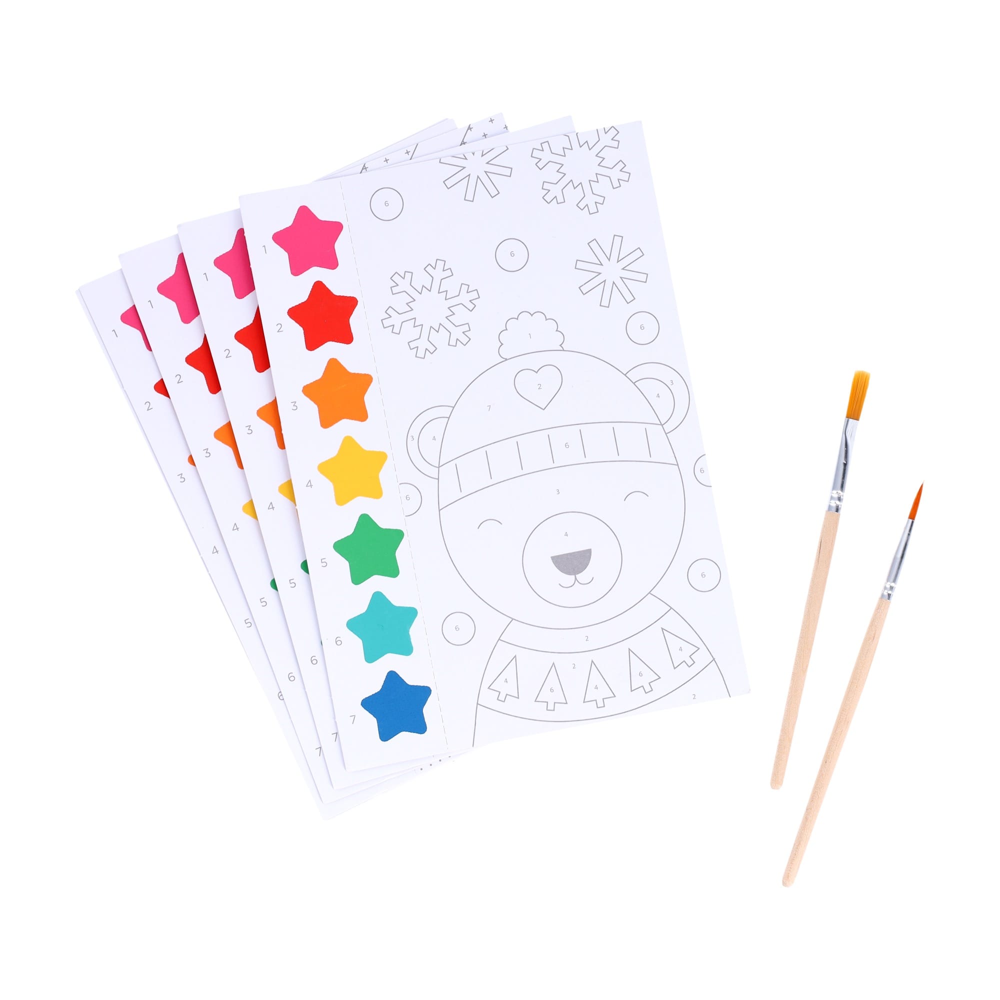 Coloring book with a bear design and star stickers, accompanied by two paintbrushes on a white background.