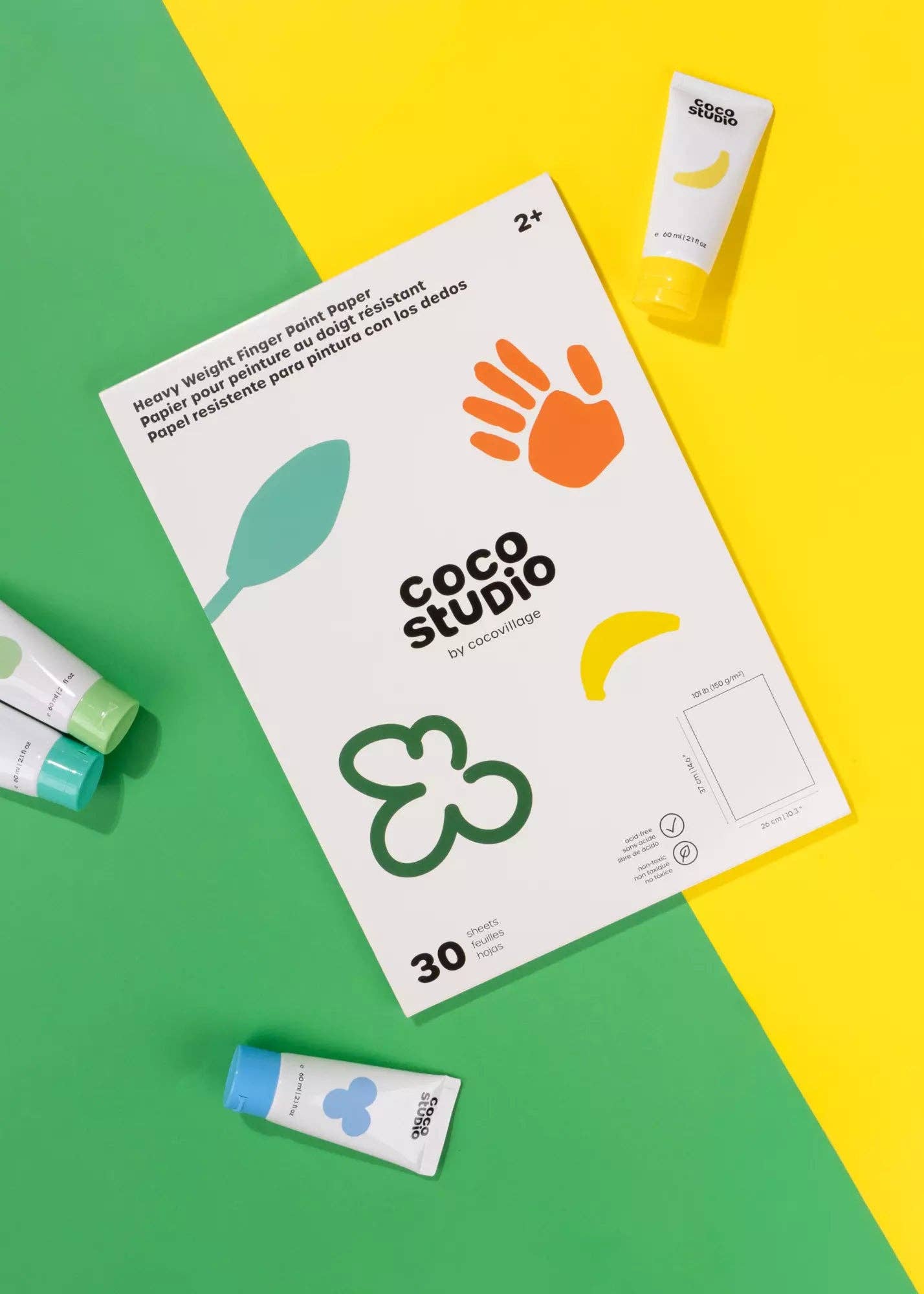 Coco Studio product packaging on a green and yellow background