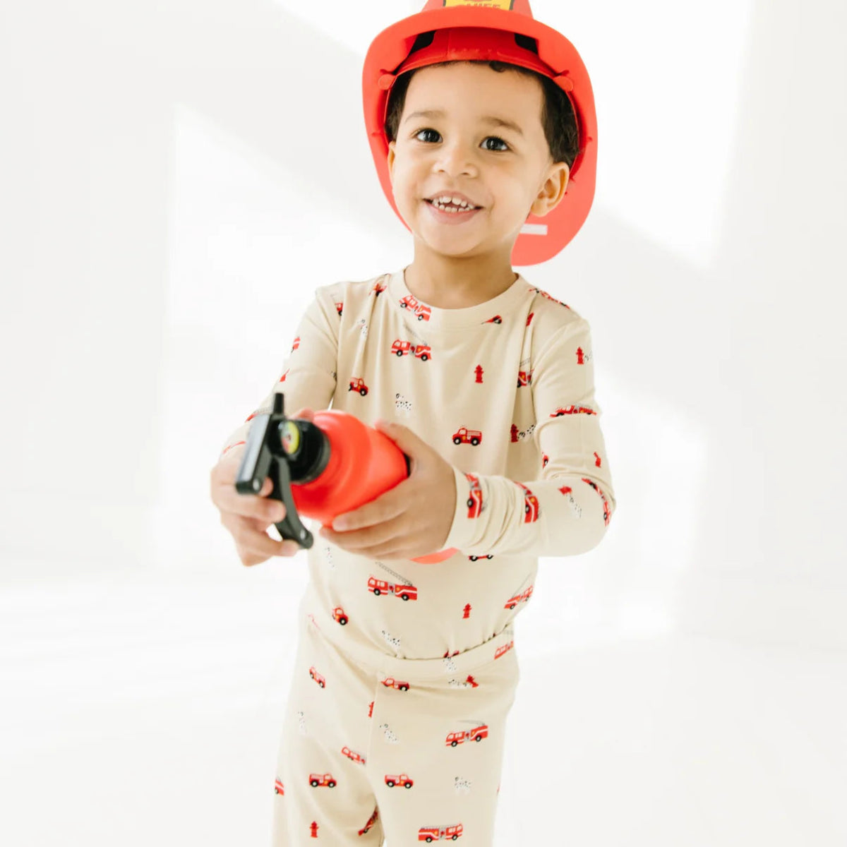 Firetruck Two - piece Pajama Set - Brave Little Ones Baby & Toddler Clothing sold by Rosebud & Jo