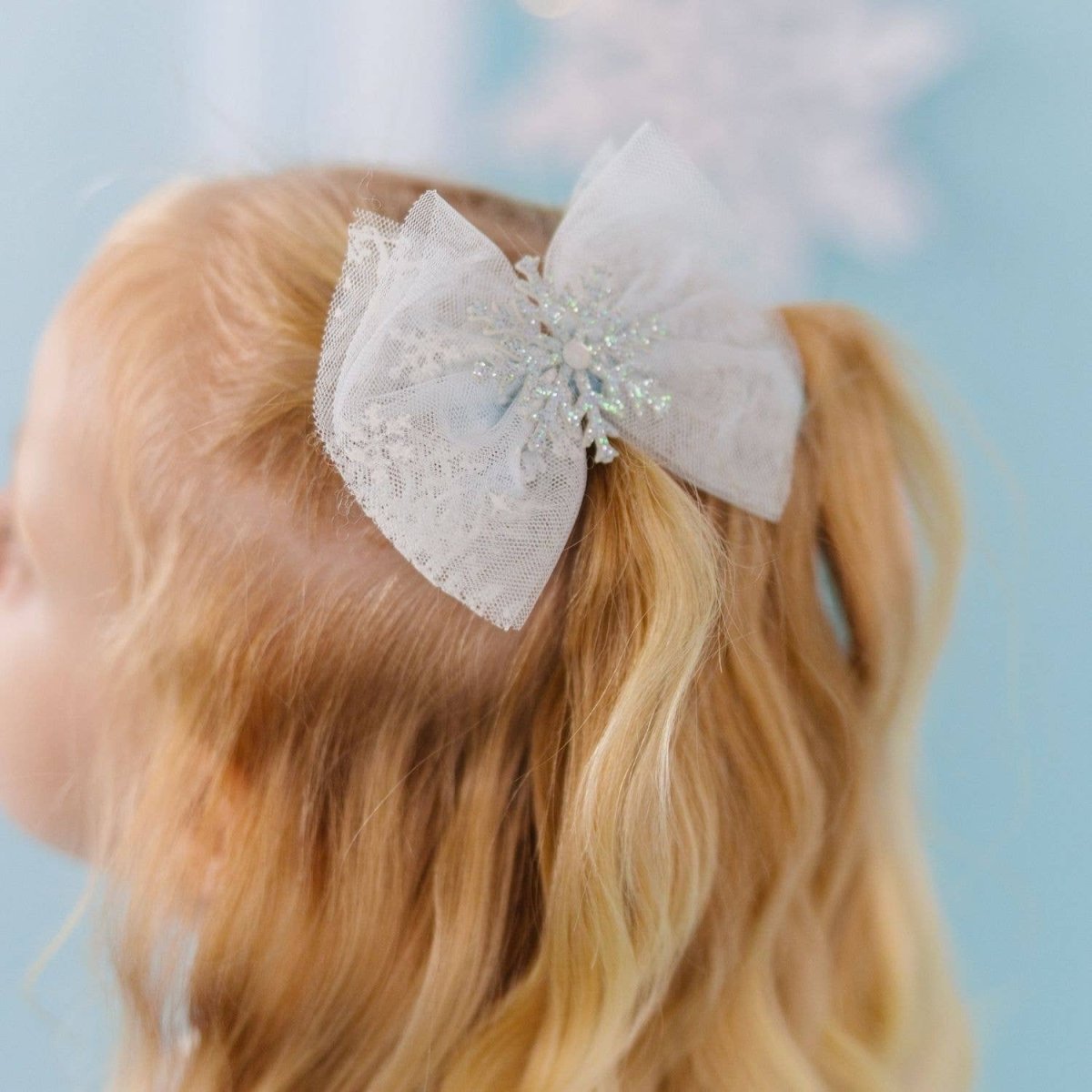 Glitter Snowflake Bow Clip - Sweet Wink Hair Accessories sold by Rosebud & Jo