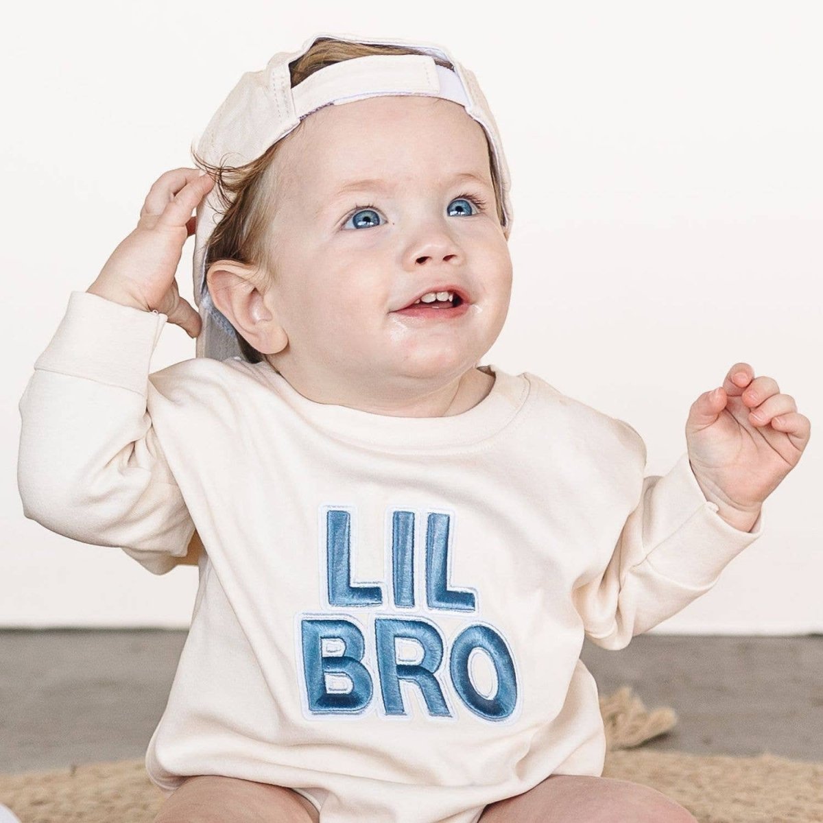 Lil Bro Embroidered Patch Long Sleeve Romper - Sweet Wink Romper sold by Rosebud & Jo
