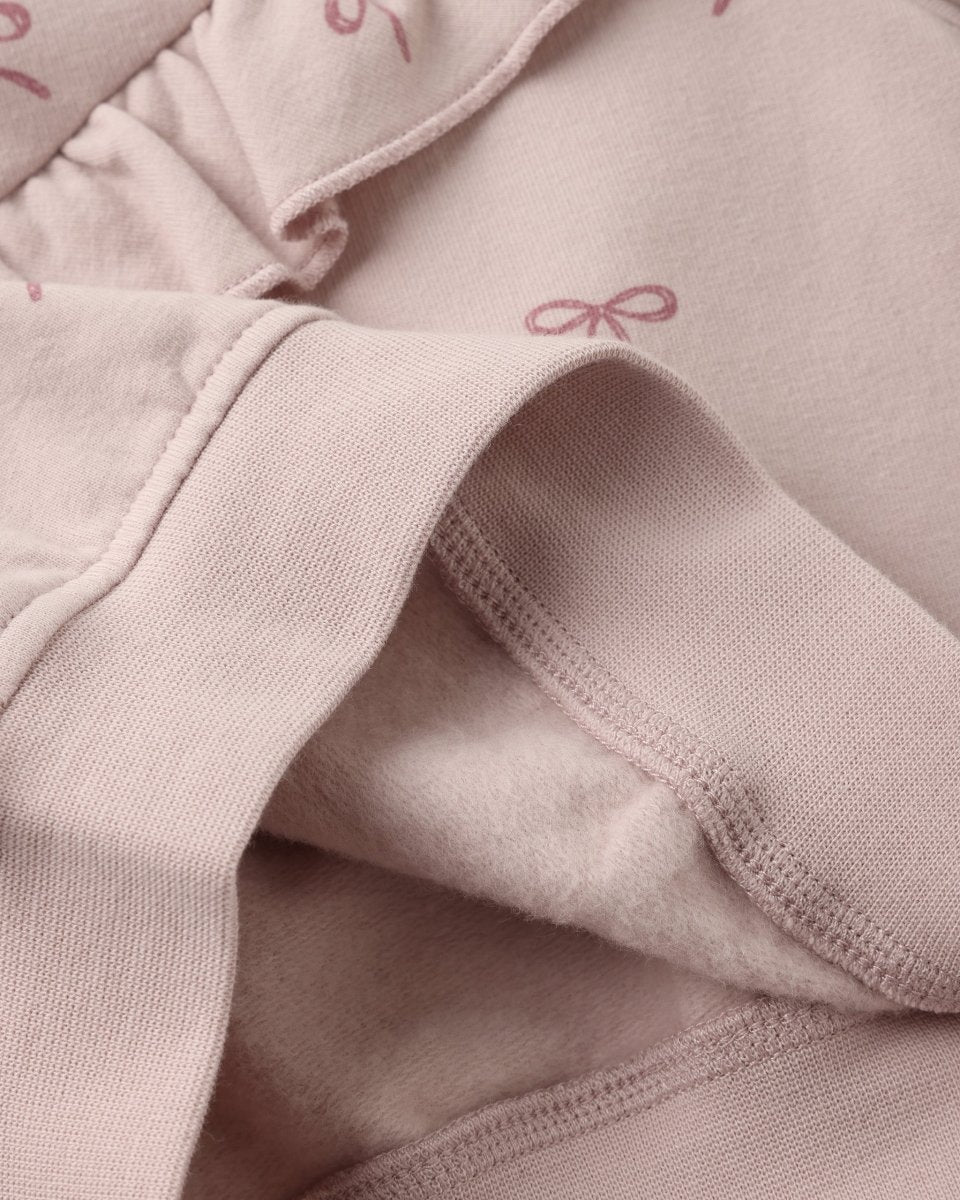 Ruffle Fleece Sweatshirt in Bows - Quincy Mae Baby & Toddler Clothing sold by Rosebud & Jo