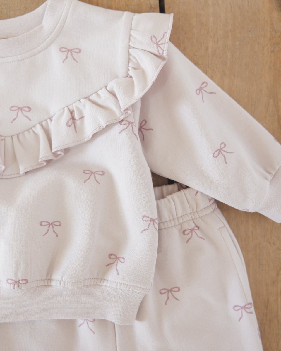 Ruffle Fleece Sweatshirt in Bows - Quincy Mae Baby & Toddler Clothing sold by Rosebud & Jo