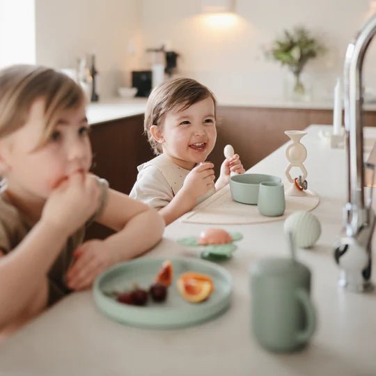 Silicone Starter Cup - Mushie feeding sold by Rosebud & Jo