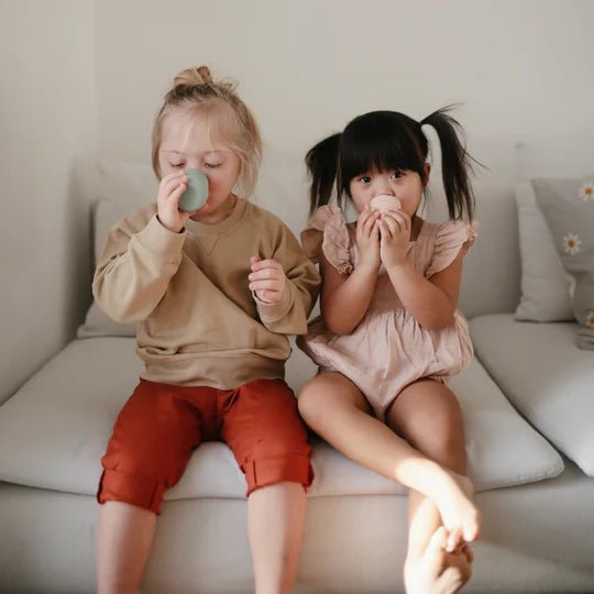 Silicone Starter Cup - Mushie feeding sold by Rosebud & Jo