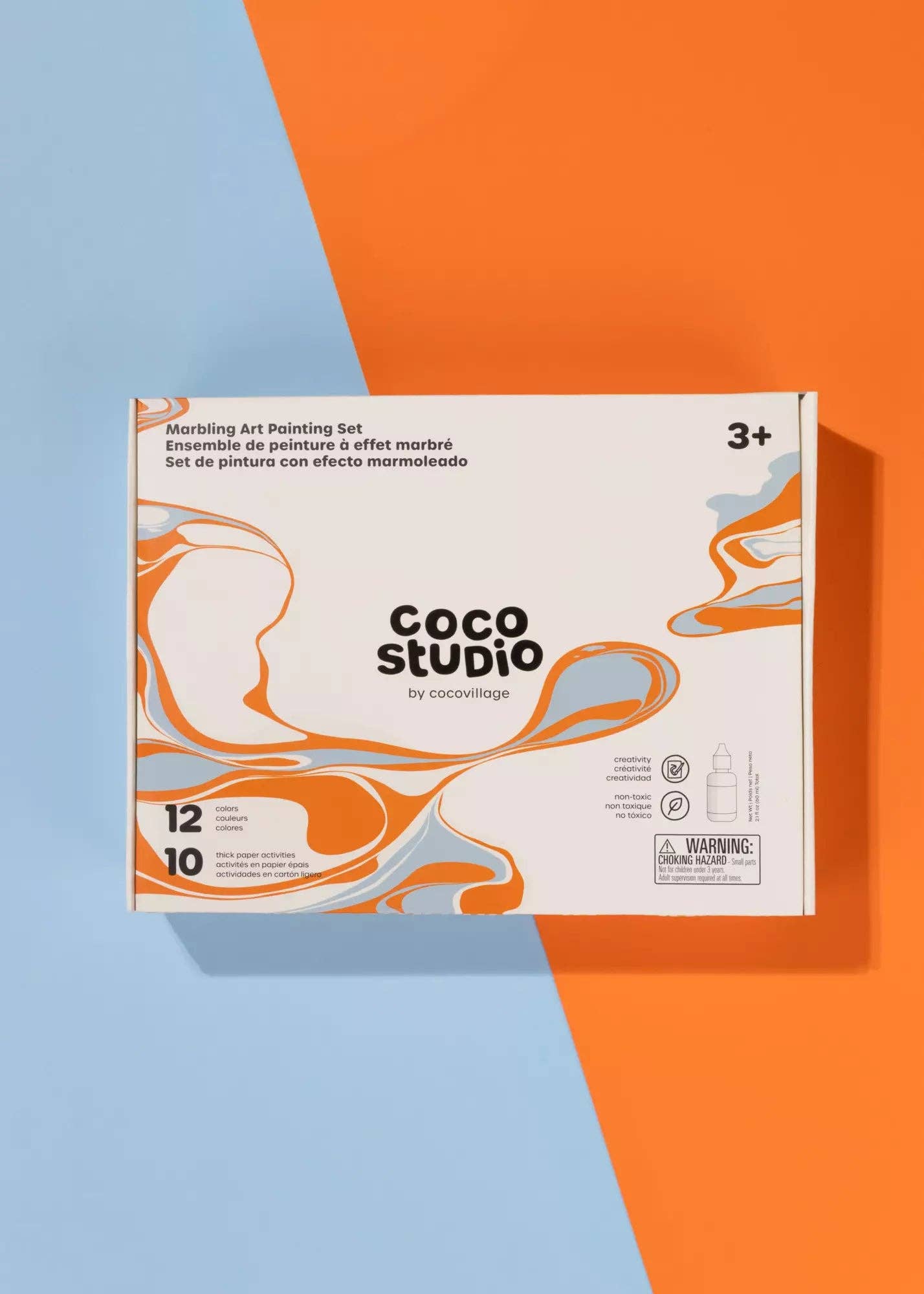 Coco Studio marbling art painting set packaging on a colorful background