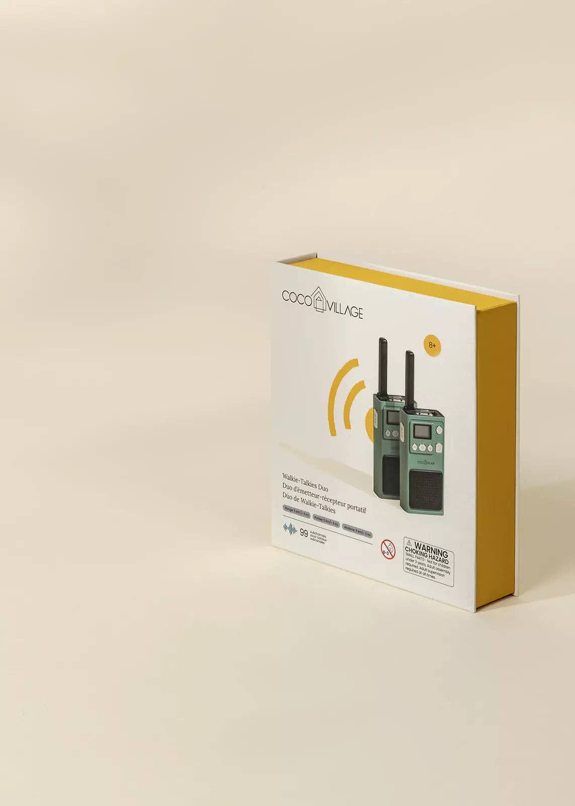 Packaging of a walkie-talkie set on a beige background