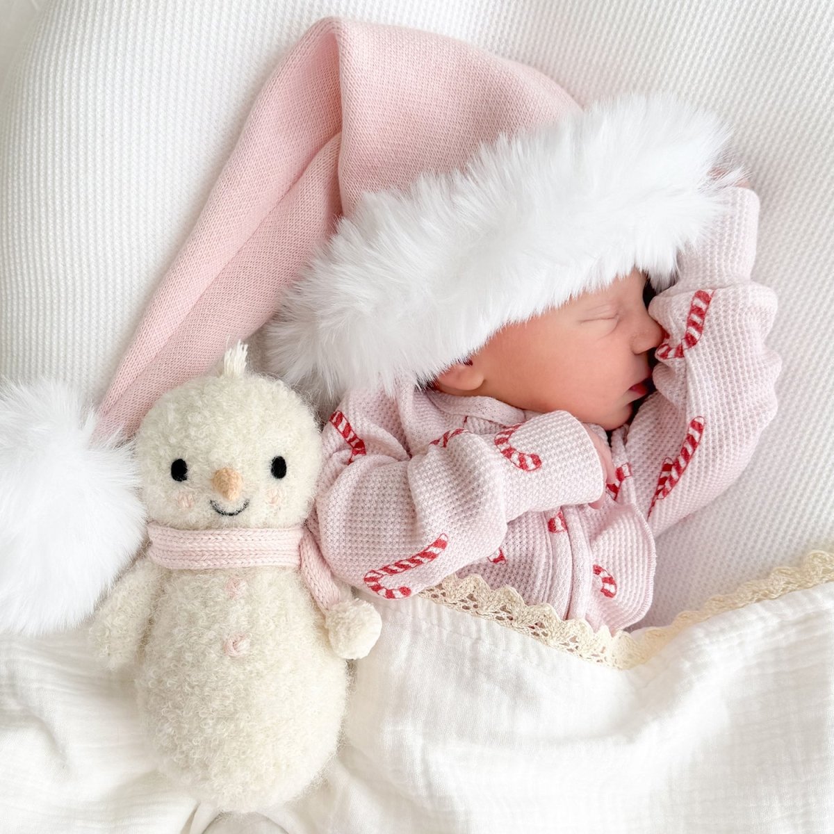 Baby Snowman with Blush Scarf - Cuddle + Kind Stuffed Animals sold by Rosebud & Jo
