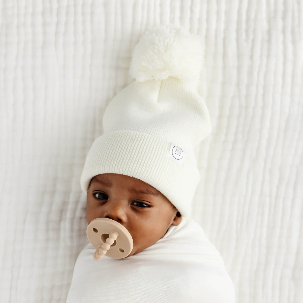 Beanie with Pom Pom in Ivory - Lou Lou & Company Hat sold by Rosebud & Jo