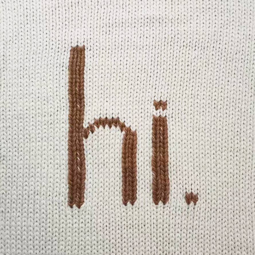 Hi. Hand Knit Baby Blanket - Huggalugs Blanket sold by Rosebud & Jo