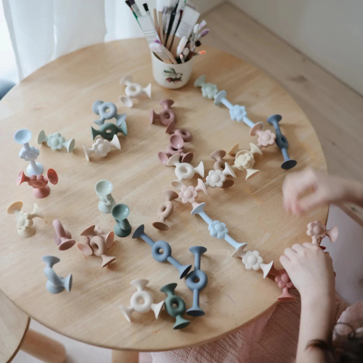 Silicone Suction Builders (Daisy) - Mushie Toys sold by Rosebud & Jo